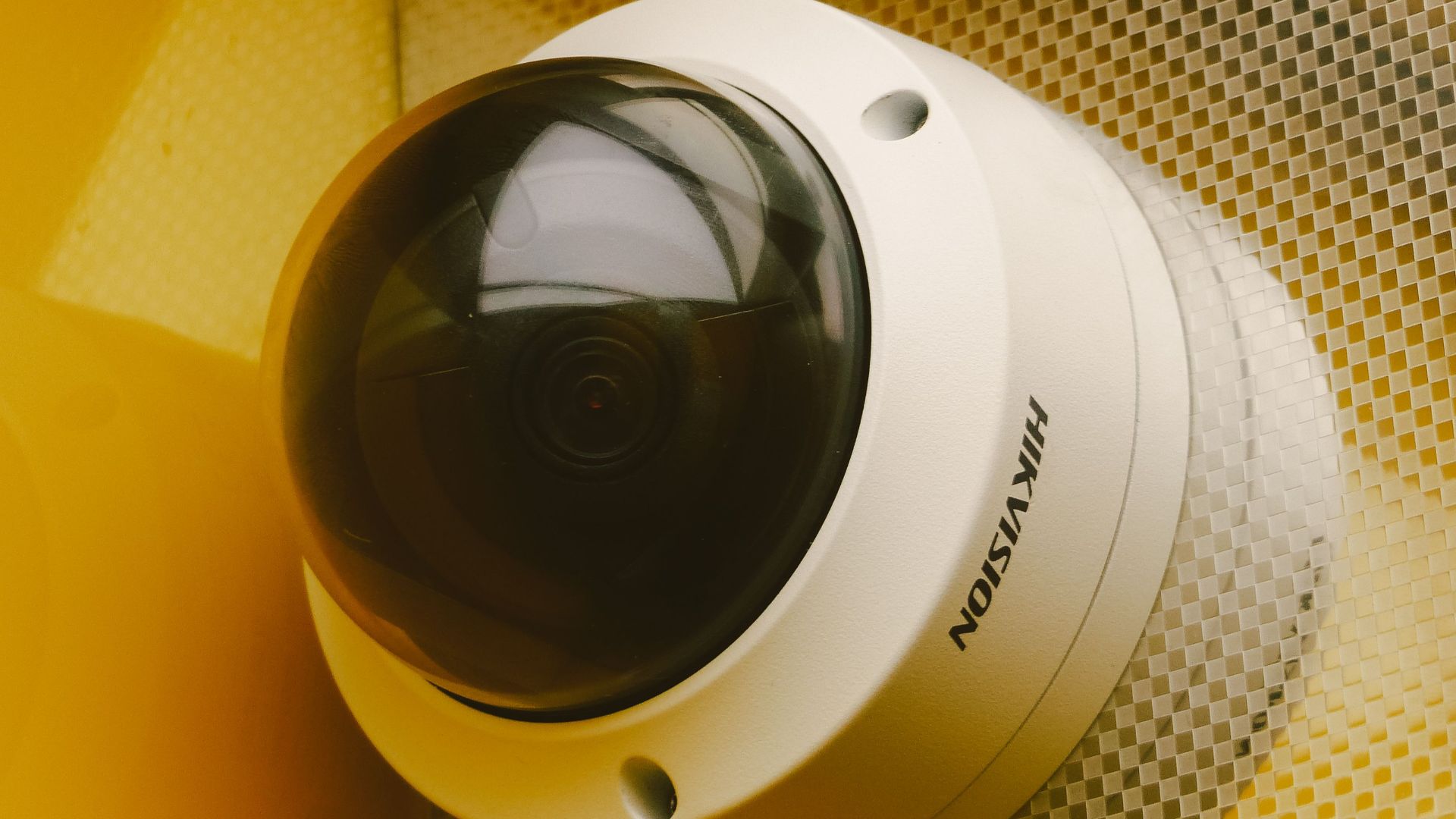 From below of modern camera for recording audio and video in building for security and protection