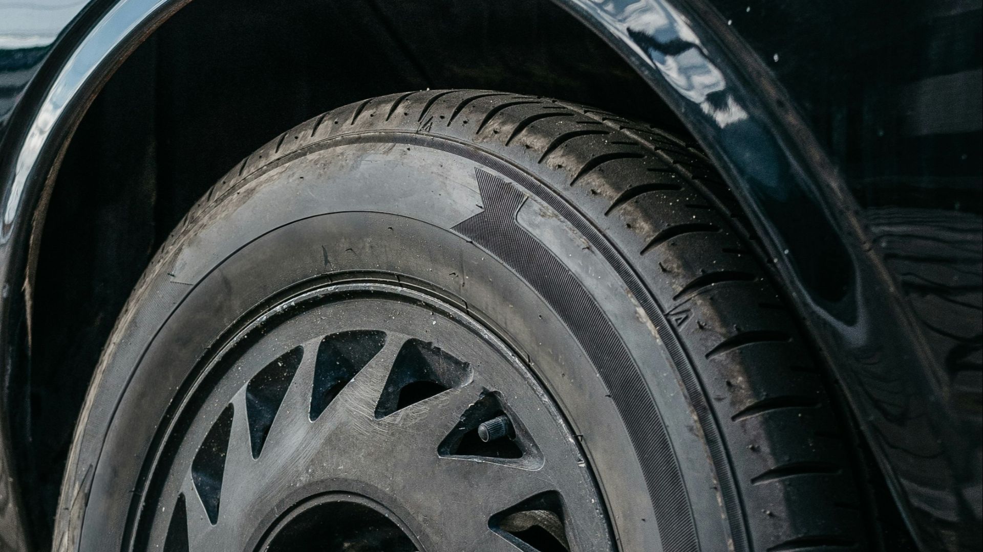 a close up of a tire on a car