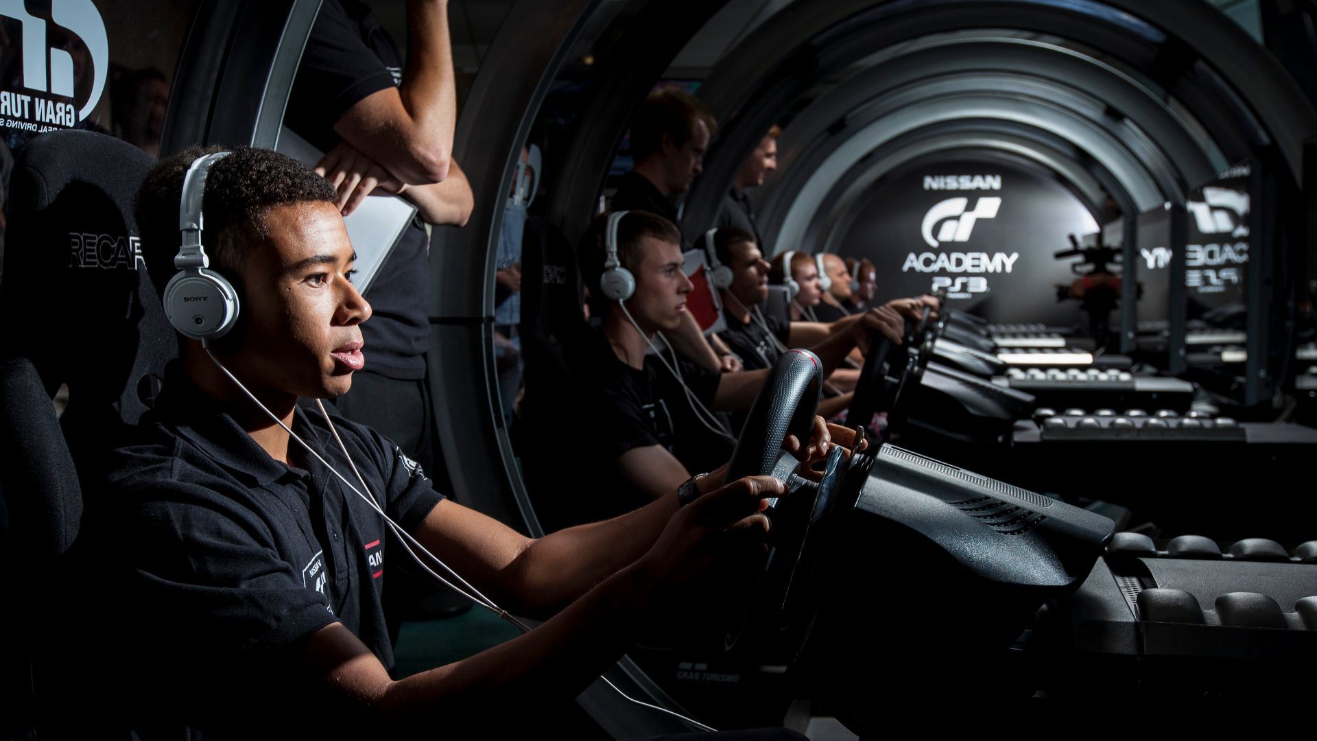 2011 GT Academy Winner Jann Mardenborough joins competitors at the UK National Final in 2013.