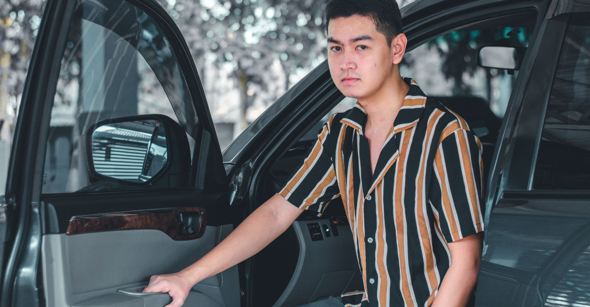 /a-man-getting-out-of-a-car