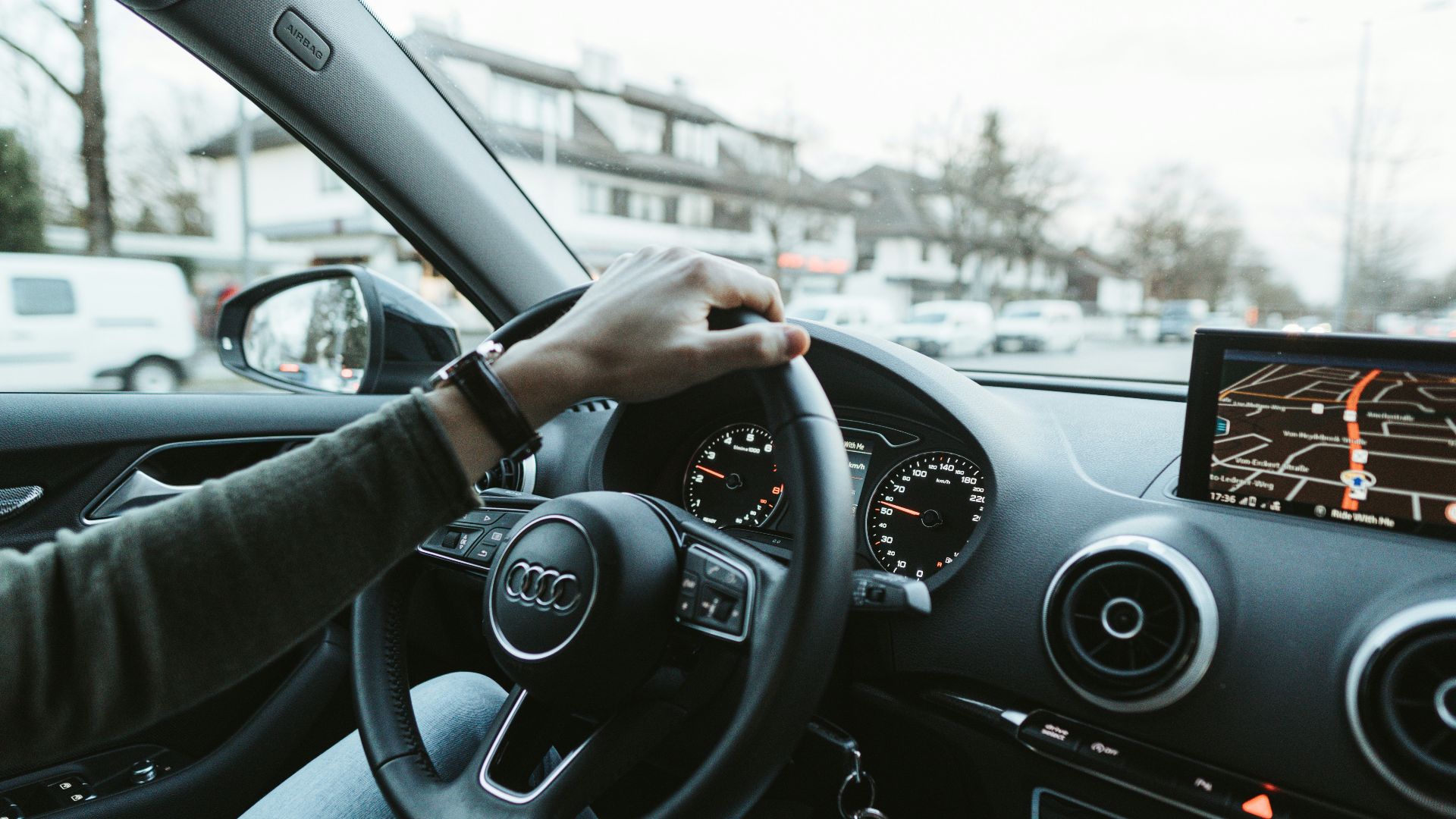 person driving car during daytime