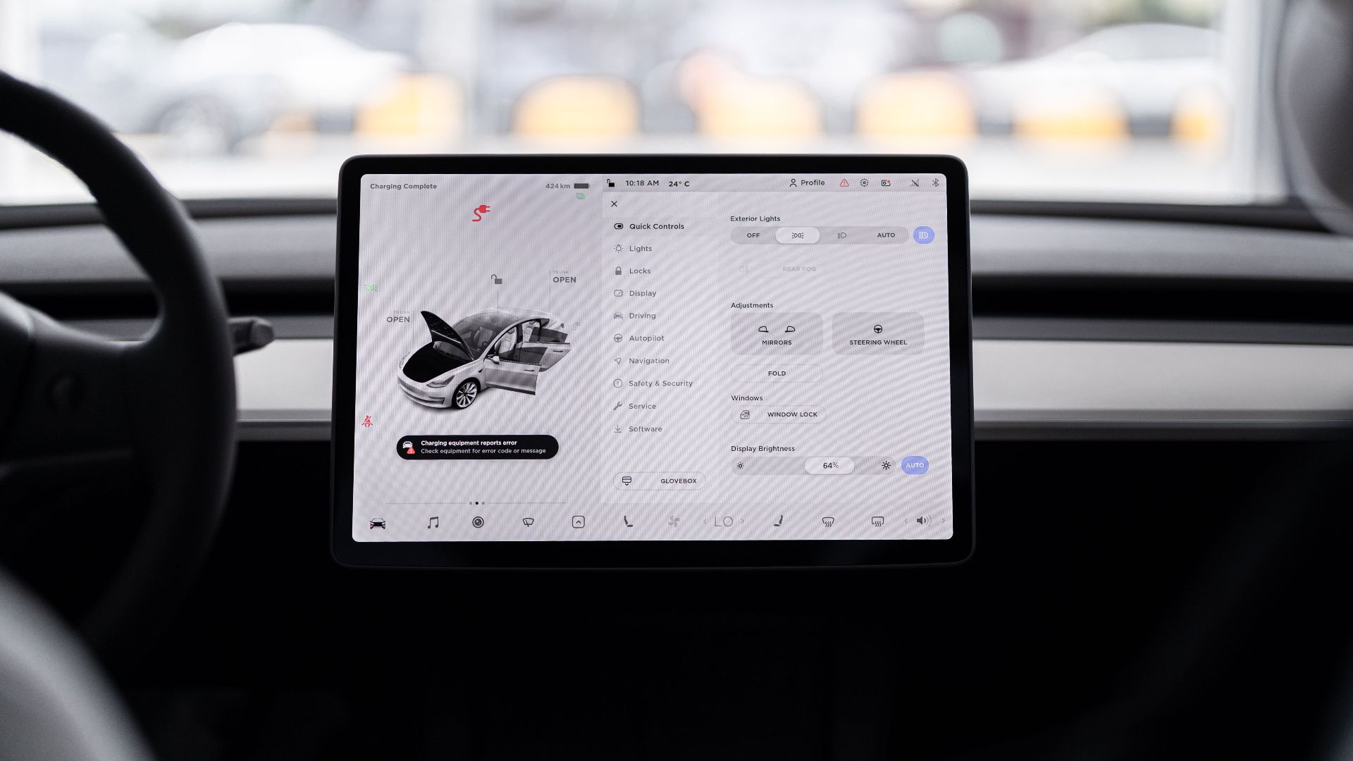 View of a modern car's dashboard featuring a digital display panel with control options.