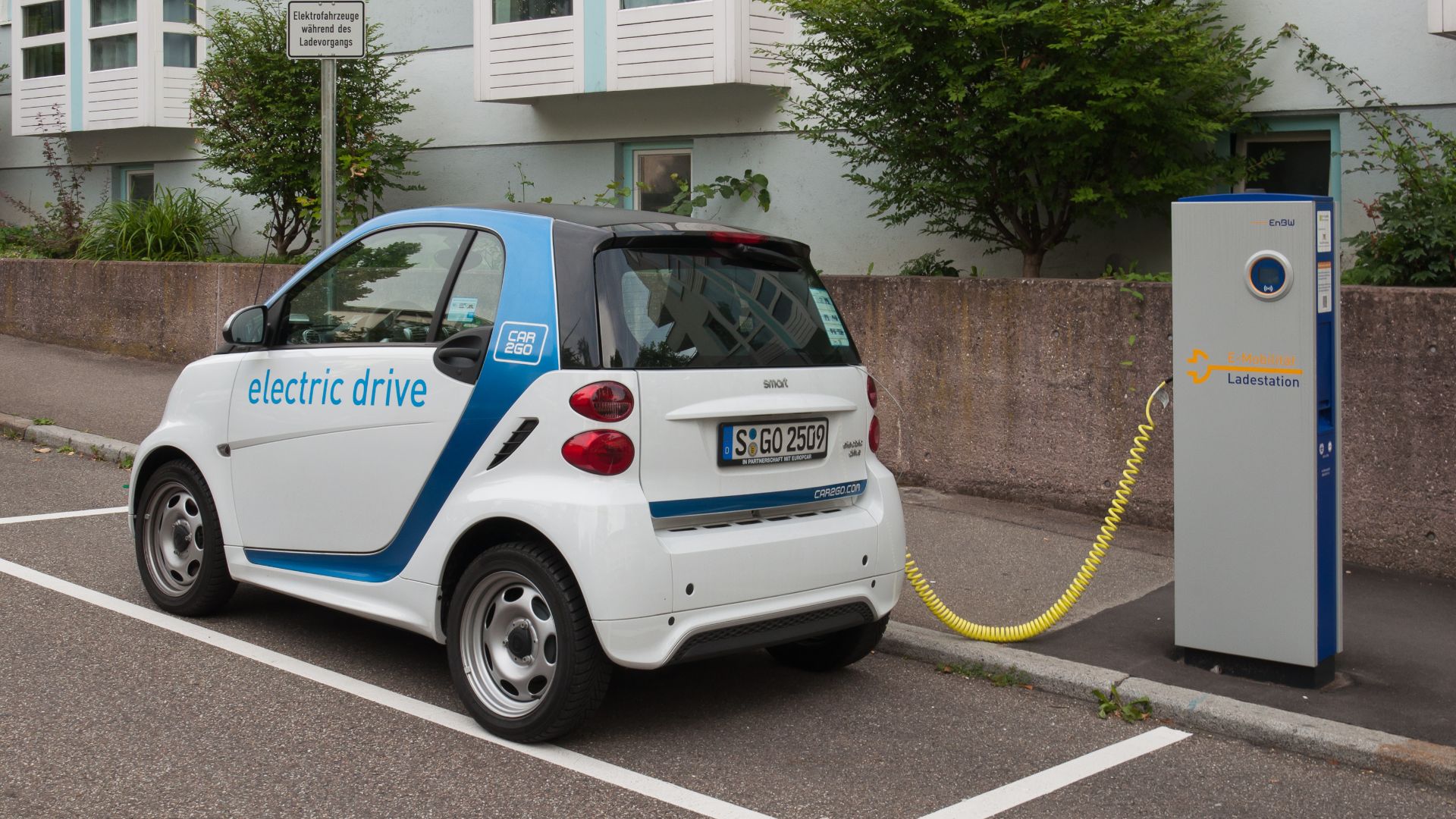 EnBW electric car charging station in Stuttgart with a 3rd generation Smart electric car of carsharing company Car2Go