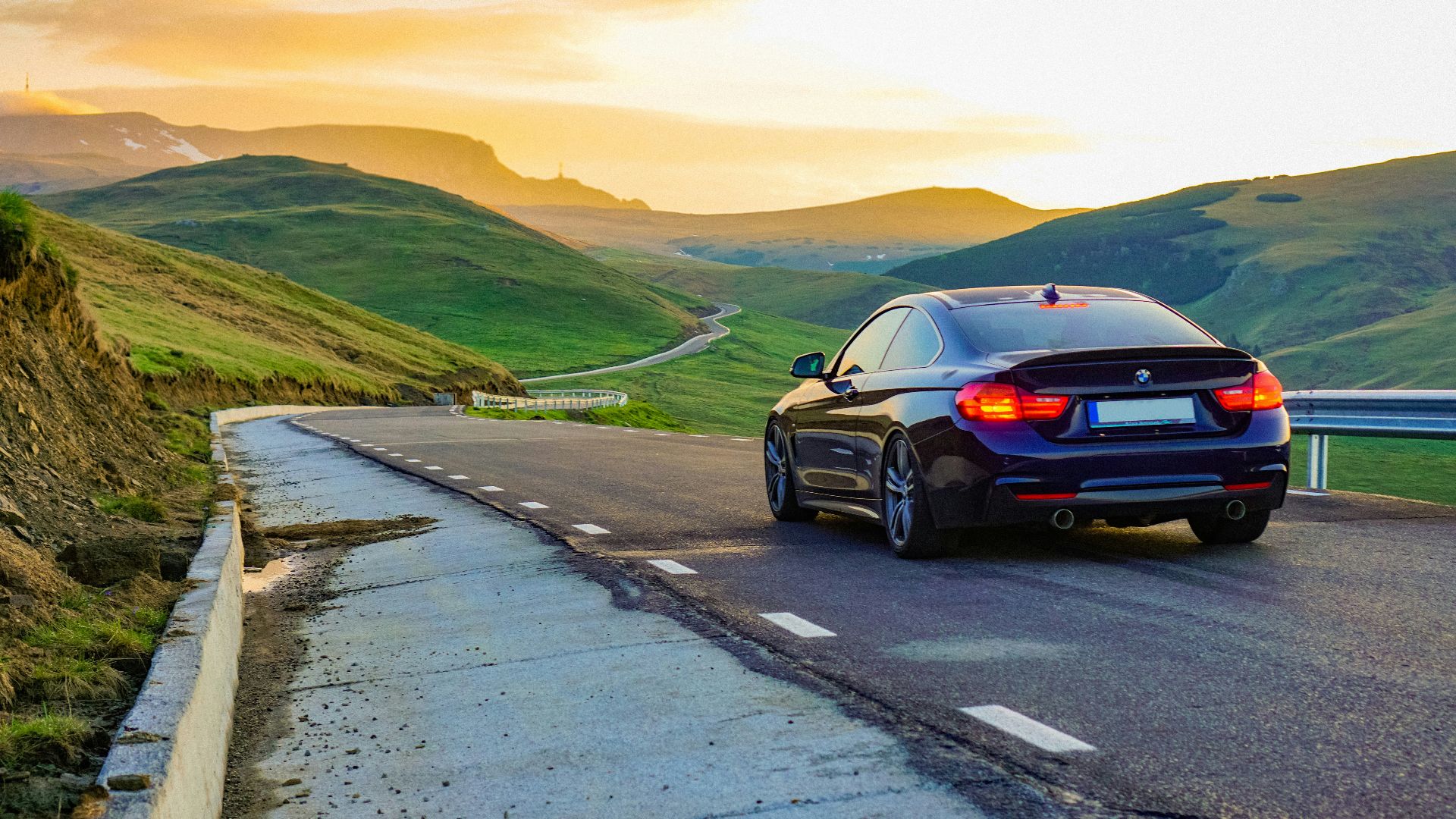 black car on road during daytime