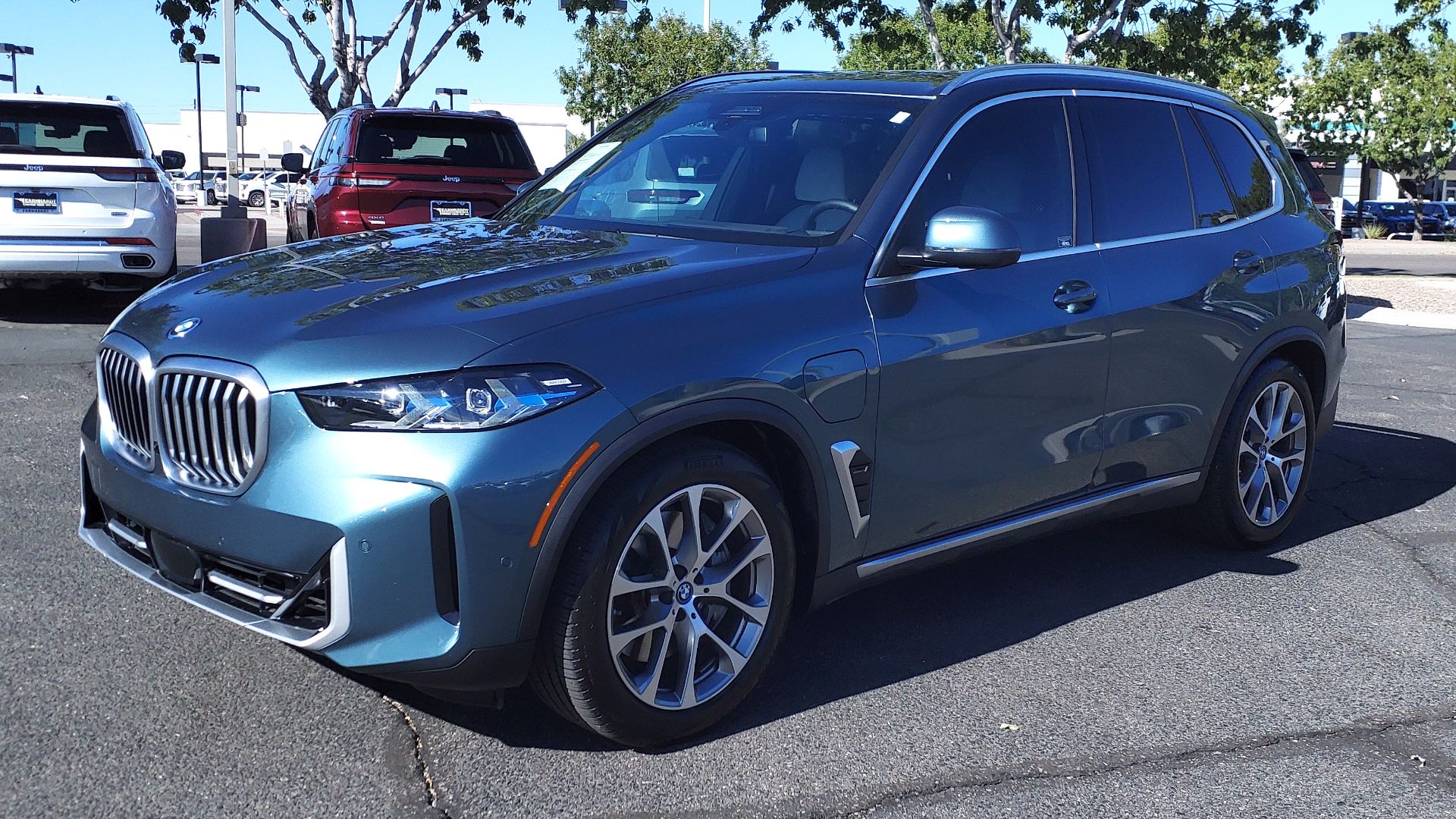 24 BMW X5 xDrive50e PHEV - Shot at Earnhardt Chrysler Dodge Jeep Ram in Gilbert AZ