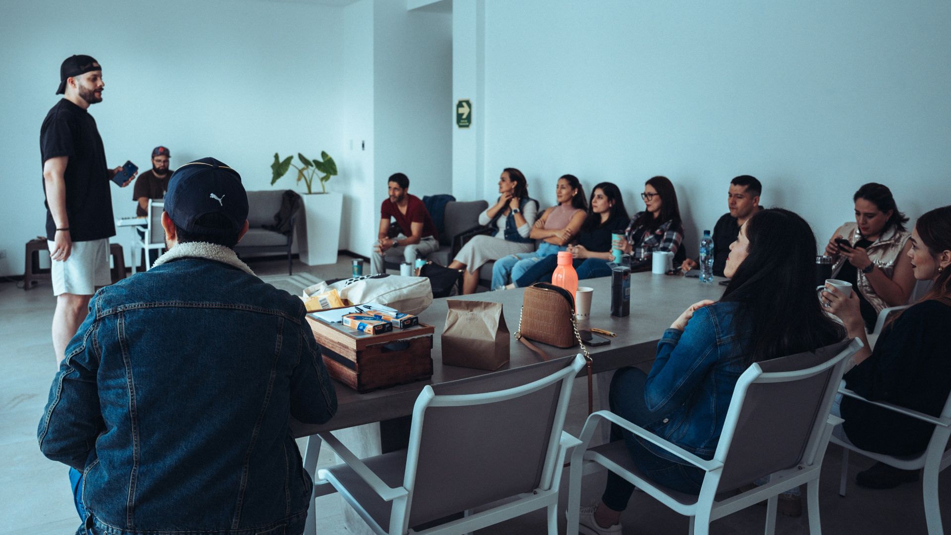 a group of people sitting around a table