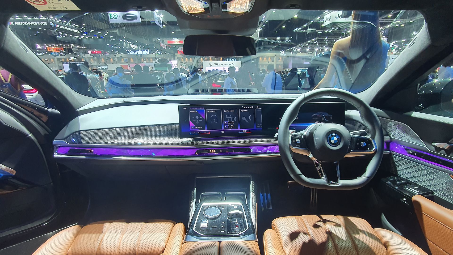 BMW G70's front Interior in Tartufo/Black
