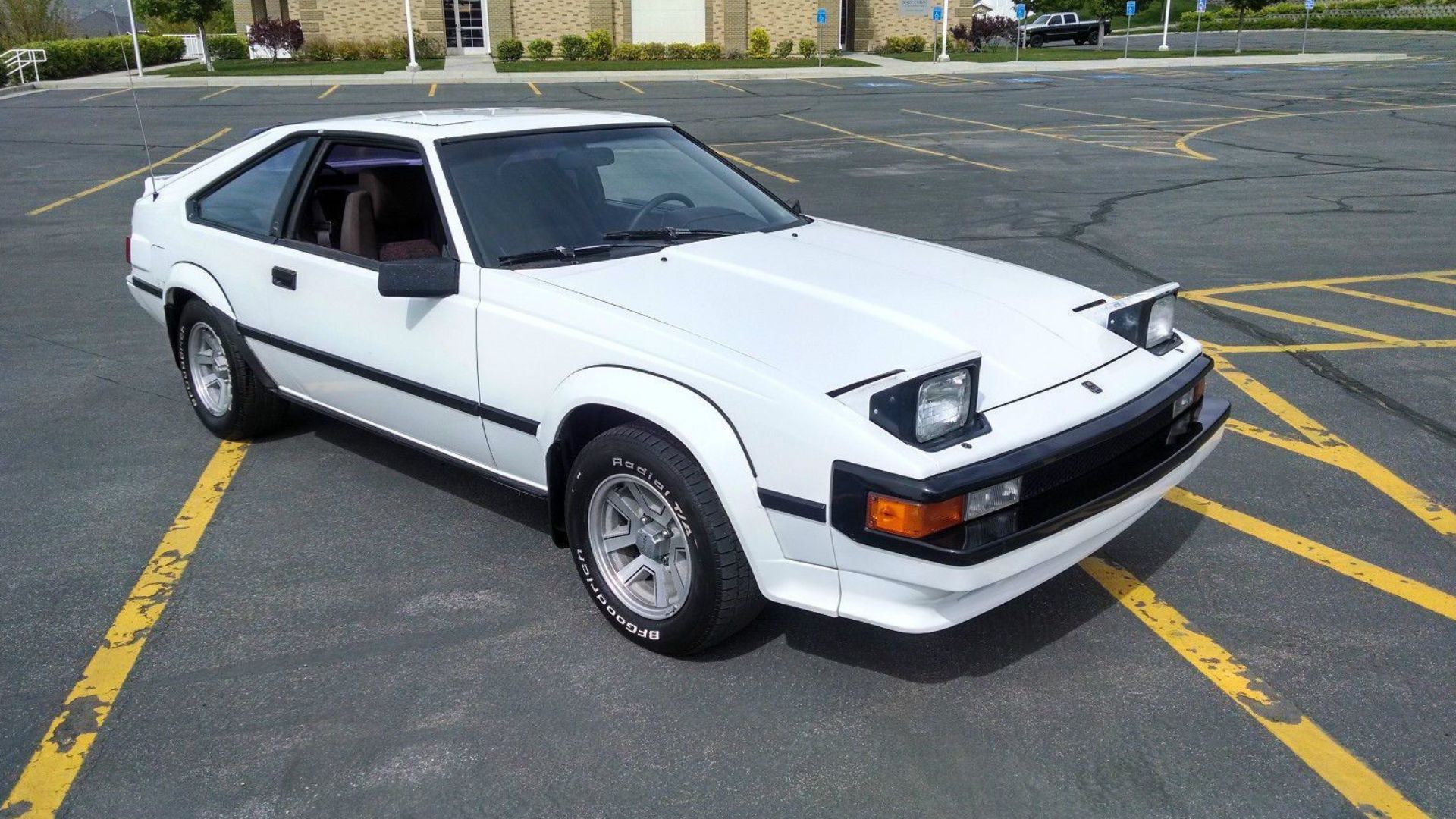 A Toyota Supra MK2 in white