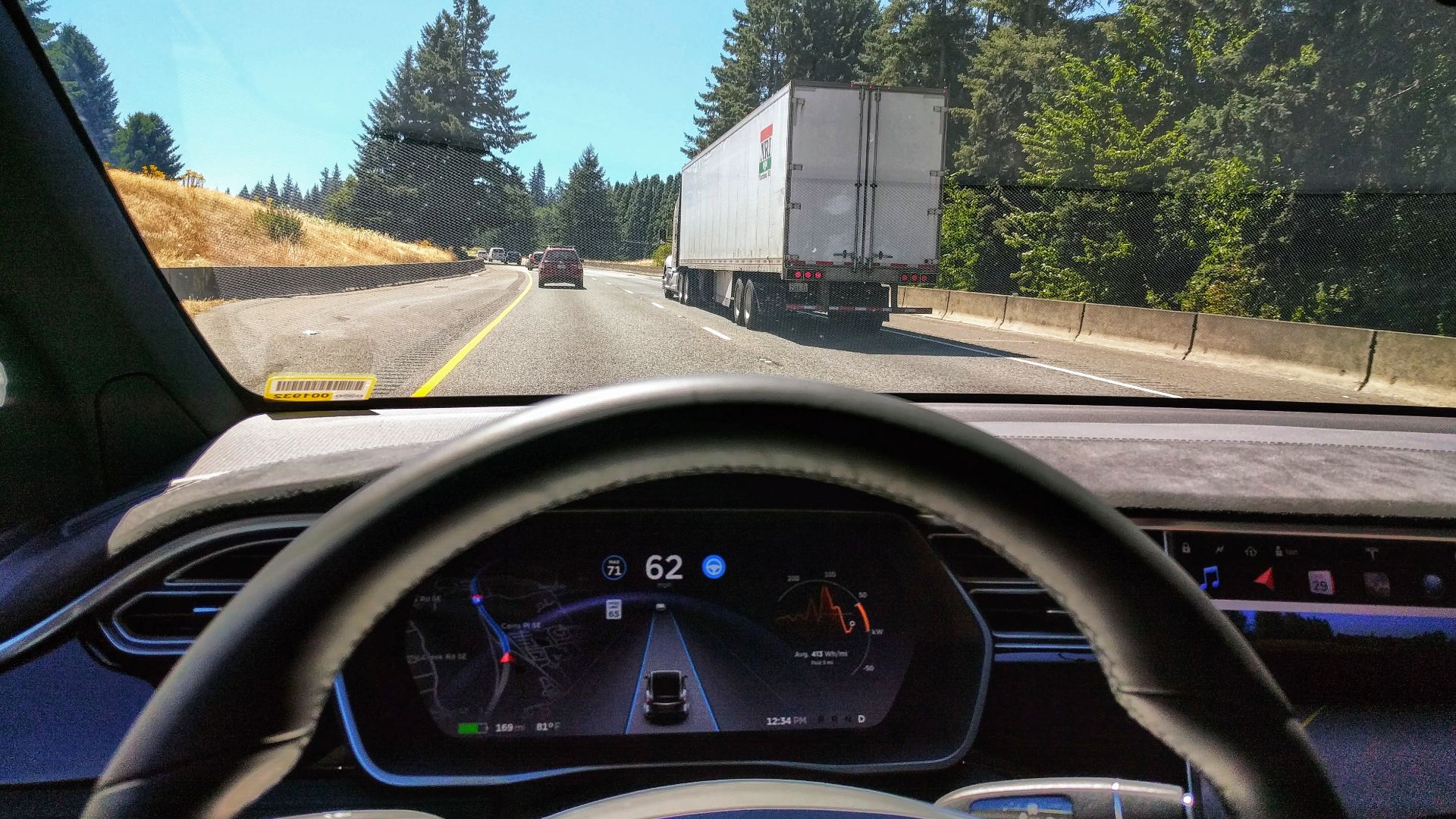 Driving in traffic with Tesla's autopilot controlling distance from the lead car and centering the vehicle in the lane.
Vehicle is a 2017 Model X 75D with dark interior.