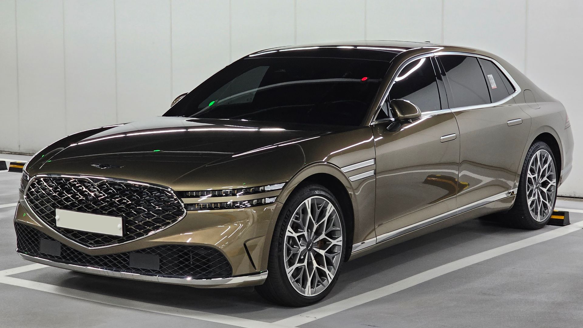 Valencia Gold Matte Genesis G90 3.5T 48V E-Supercharger AWD RS4 sedan.