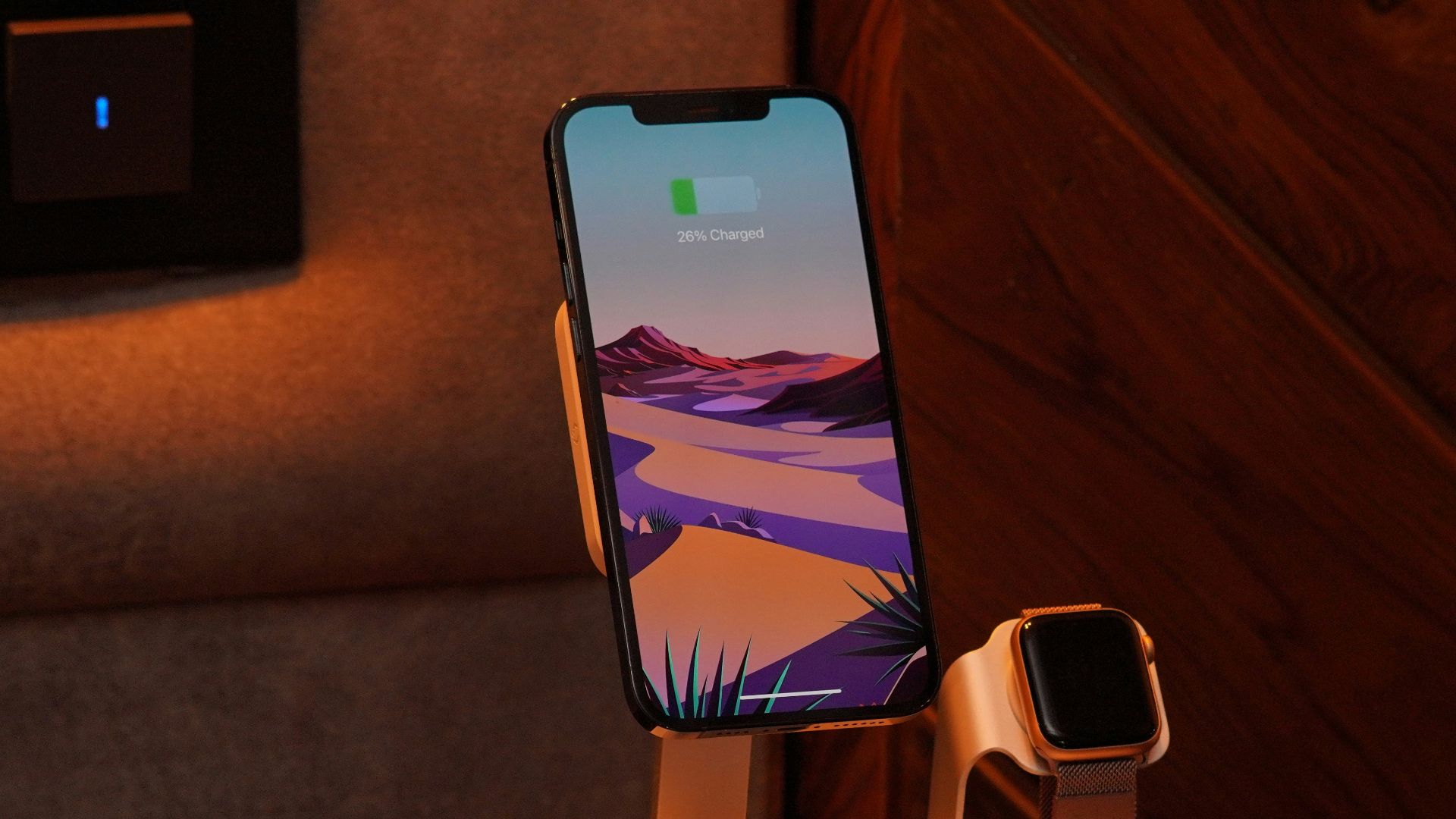 a cell phone and a charger on a table