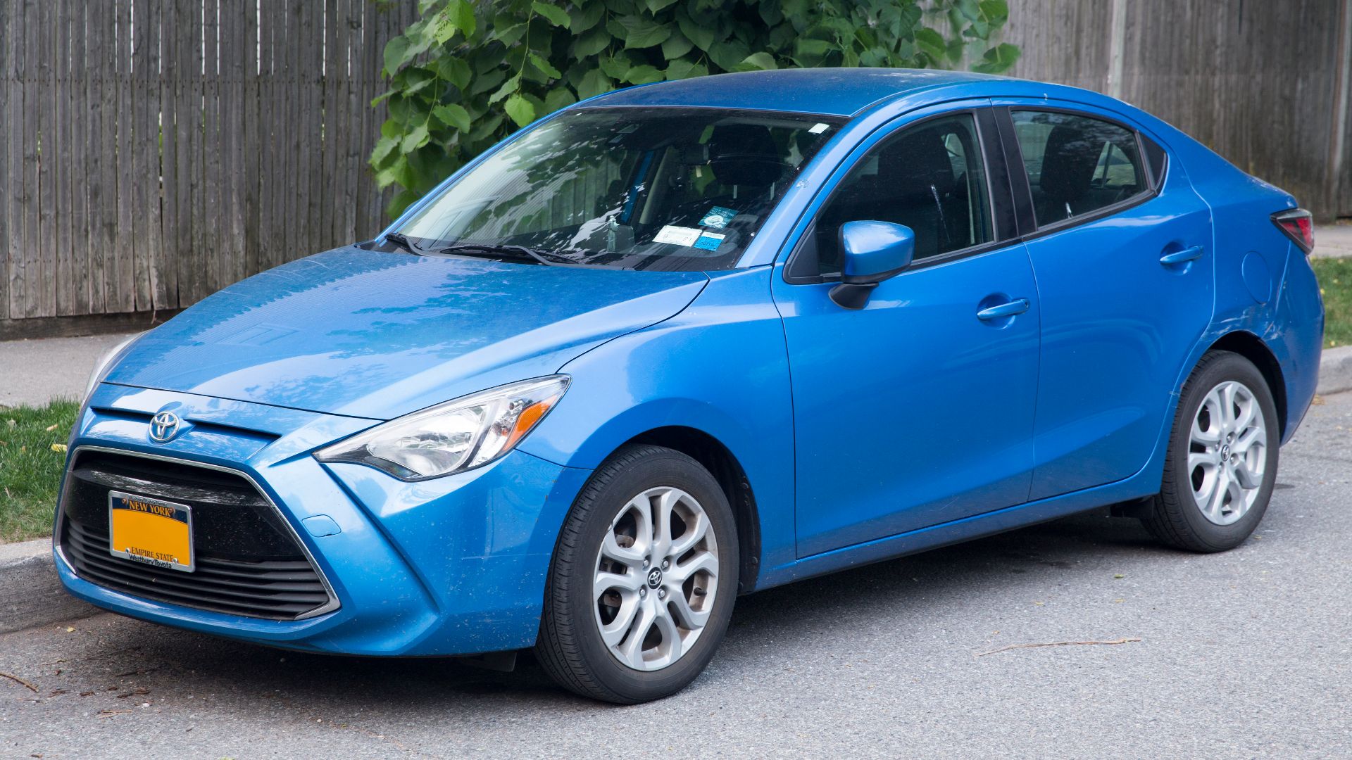 A 2017 Toyota Yaris iA in Blue. Six-speed manual (!), 1.5-litre inline-four, built in Salamanca, Guanajuato, Mexico.