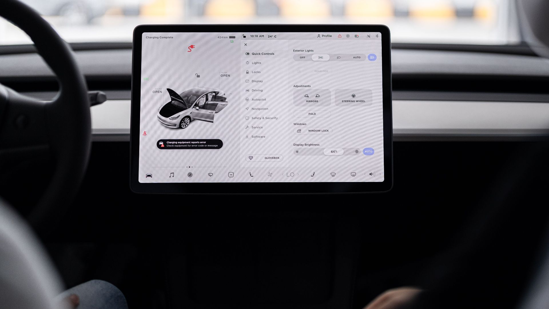 View of a modern car's dashboard featuring a digital display panel with control options.