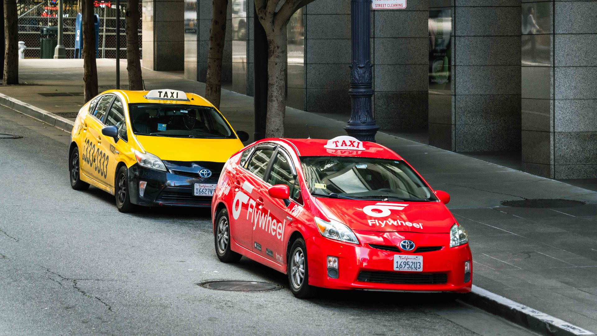 Colorful taxis parked on the street in downtown San Francisco, California.