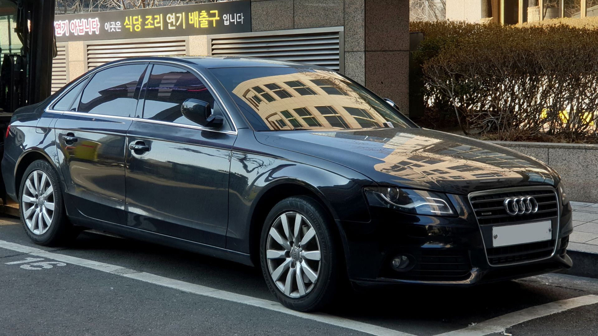 Black Audi A4 2.0T Quattro B8 sedan
