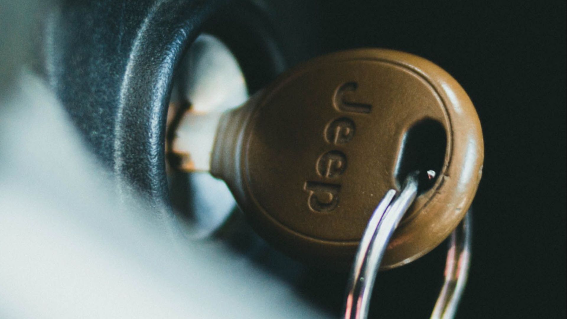 Detailed close-up of a Jeep key inserted in an ignition, captured with Canon EOS 5D Mark III.