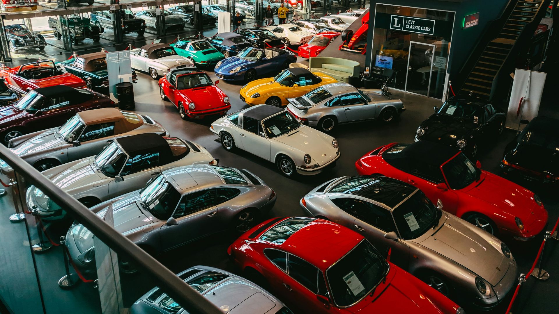 cars parked in front of building during daytime