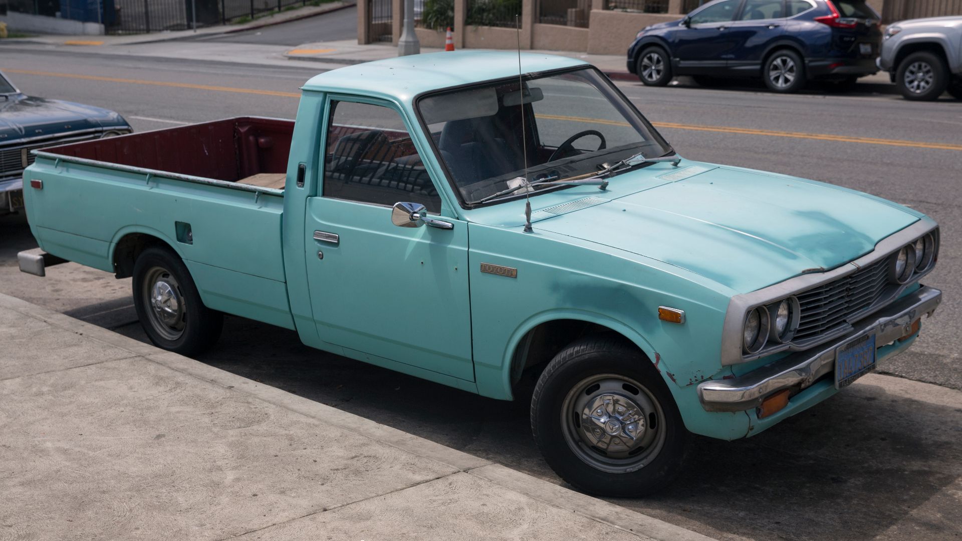 1975 Toyota Hilux in Los Angeles. Repainted with some homemade touchups.