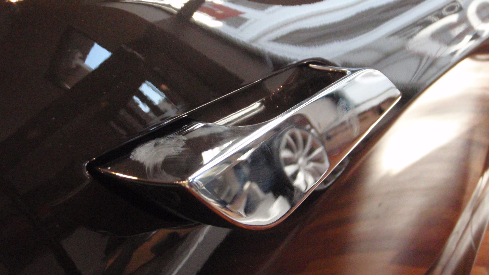 Tesla Model S outside door handle (unlocked position) displayed in the Tesla Store, Copenhagen
