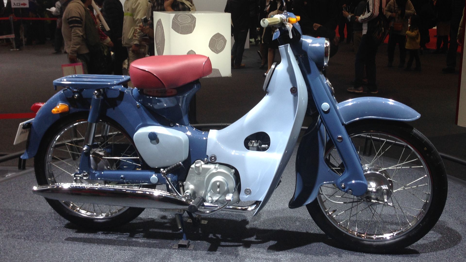Honda Super Cub C100 photographed at the Tokyo Motor Show 2013.