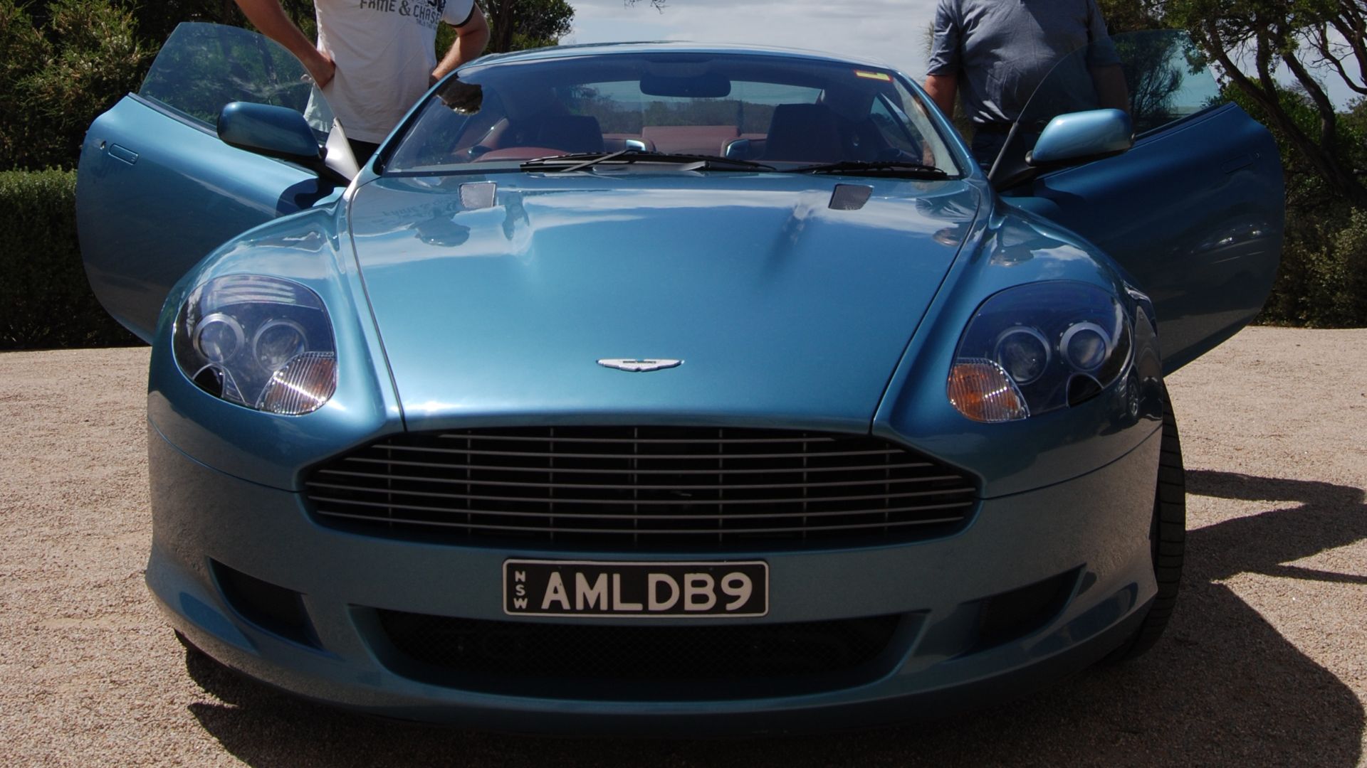 Aston MArtin DB9 Sport. The prettiest, sexiest car on planet Earth. Shut the doors.