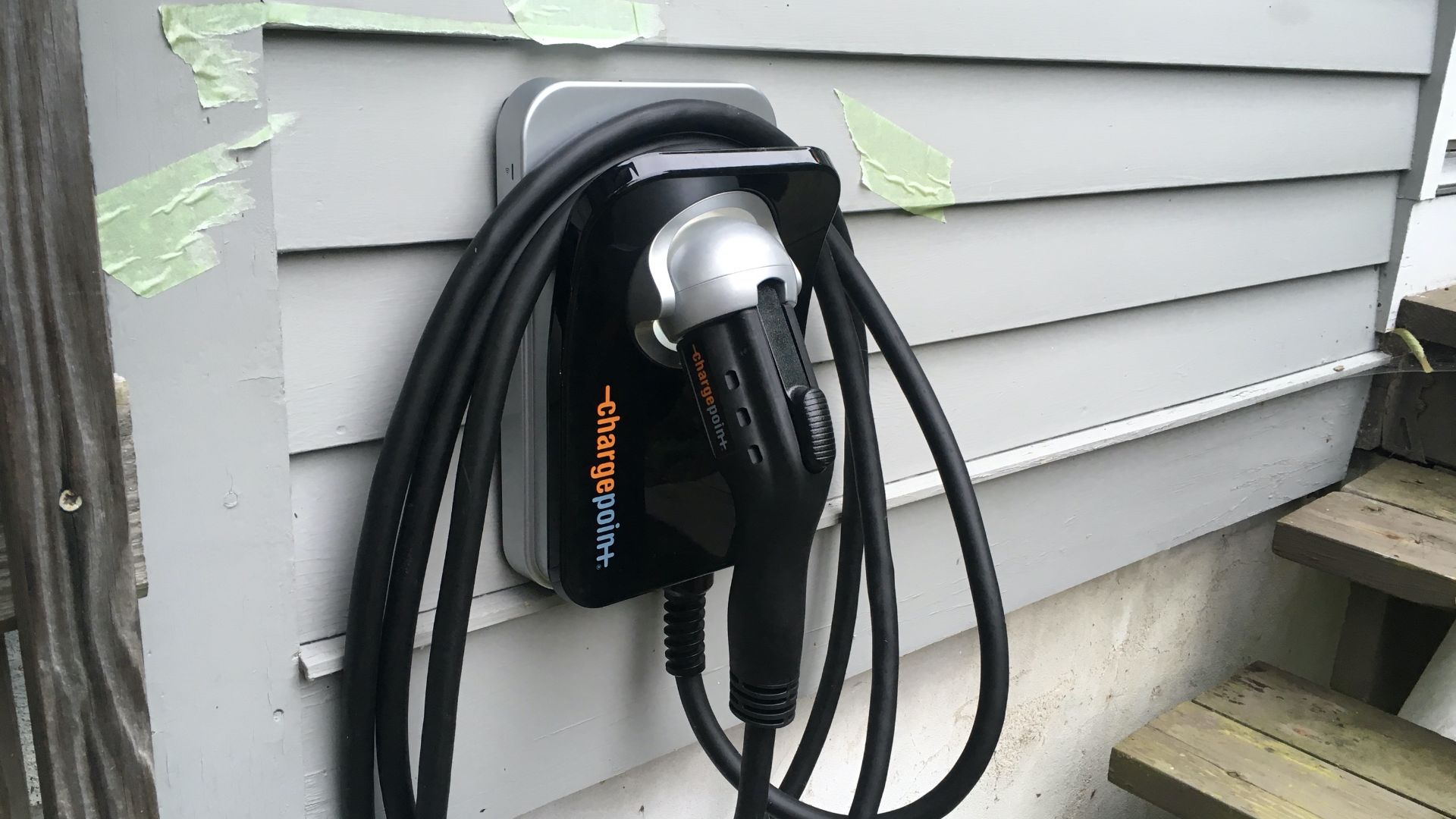 Home EV charging by ChargePoint in CT. The tape was used to cover the connection in to the house before the charger was actually installed.