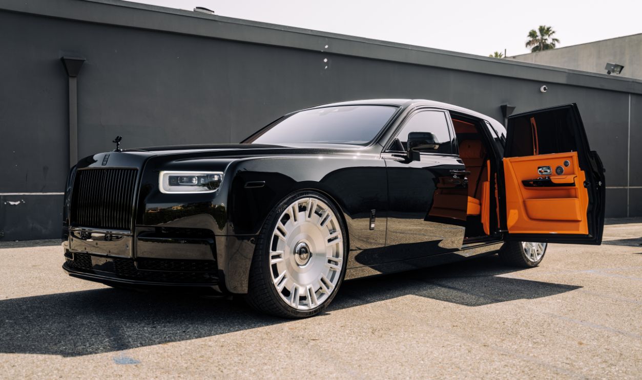 LA, CA, USA March 24, 2025 Rolls Royce Phantom parked showing the rear door open