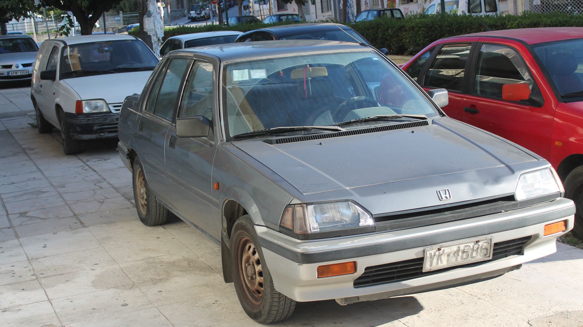 Likely to be an early one, due to the plate format used until 1982, with a few surplus combinations left over.  This is an attractive and uncommonly seen Honda Civic from the mid 1980s.  It's refreshing to see a Civic which hasn't been messed around with 