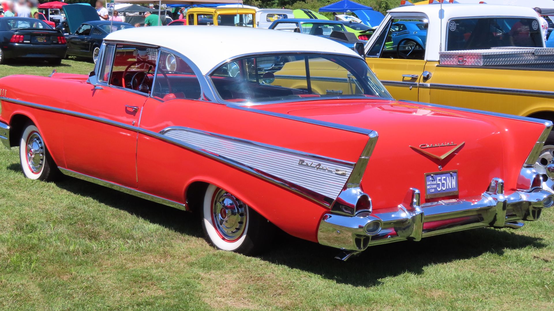 1957 Chevrolet Bel Air Sport Coupe photographed at the July 20th, 2024 Hovis Truck & Auto Supply Annual Cruise-In in Mercer, Pennsylvania. Finished in India Ivory over Matador Red.