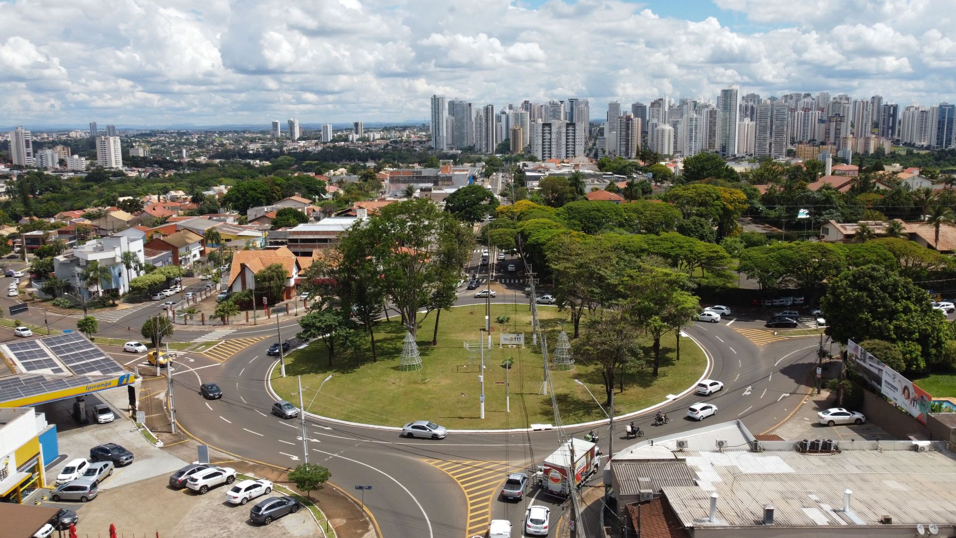 Captivating aerial shot of a roundabout in Londrina, Brazil, with skyscrapers and greenery.