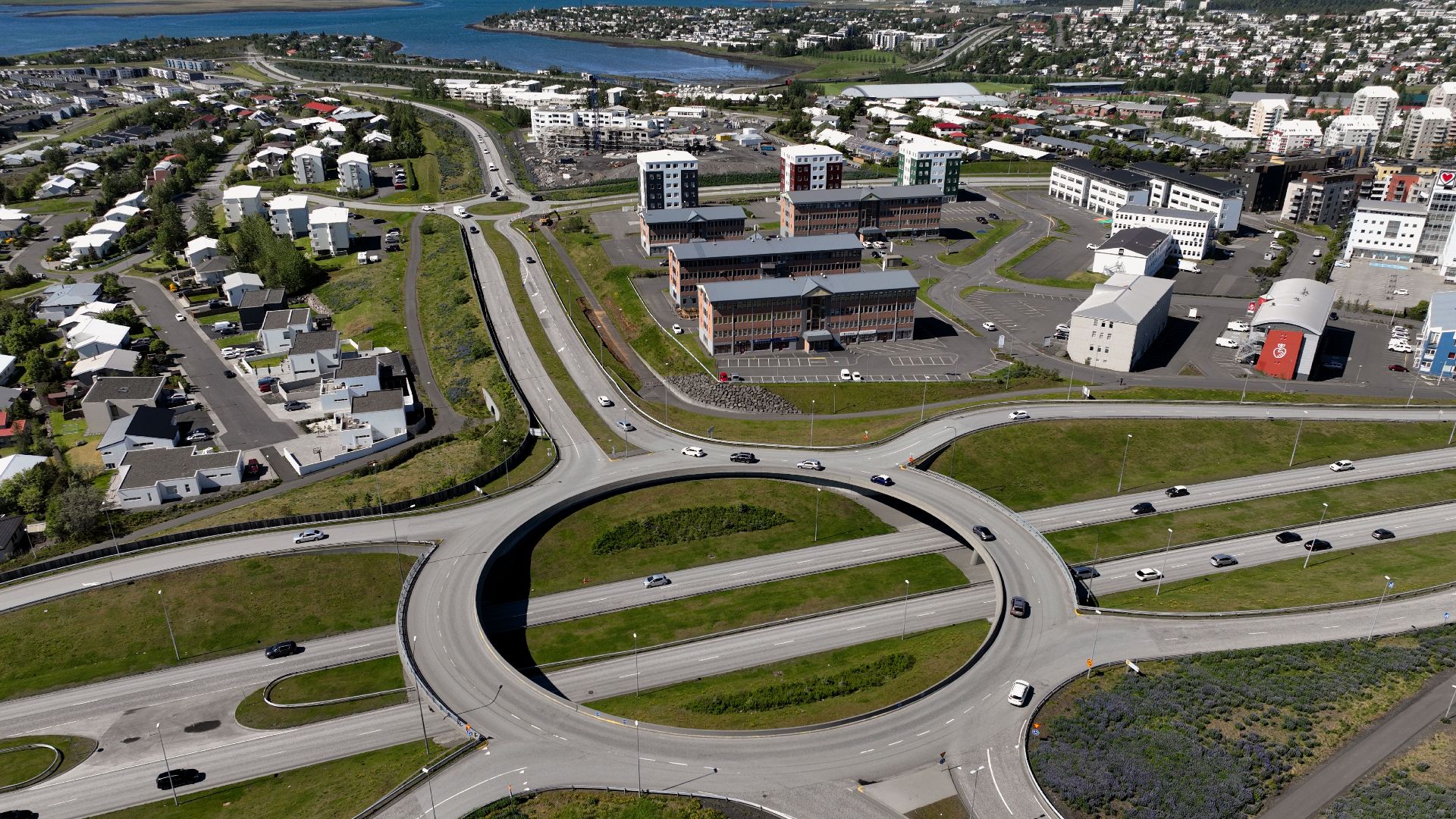 Aerial photo of a roundabout in Gardabaer, showcasing Icelandic urban architecture and road systems.