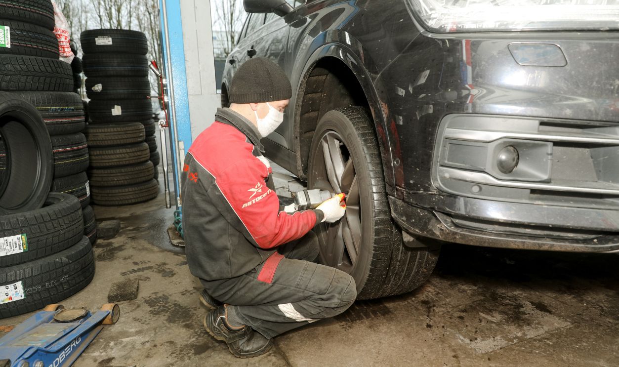 MINSK, BELARUS - 1 March, 2022: changing winter tires at a service station