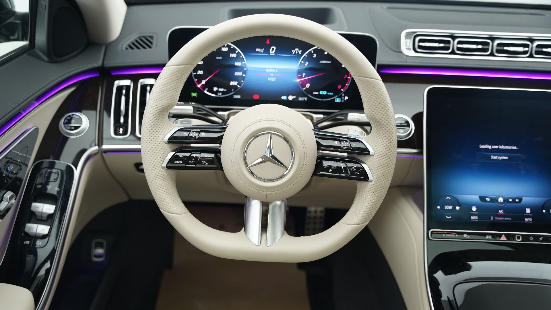 Explore the sophisticated, modern interior of a Mercedes-Benz S Class featuring high-tech digital displays and elegant design.