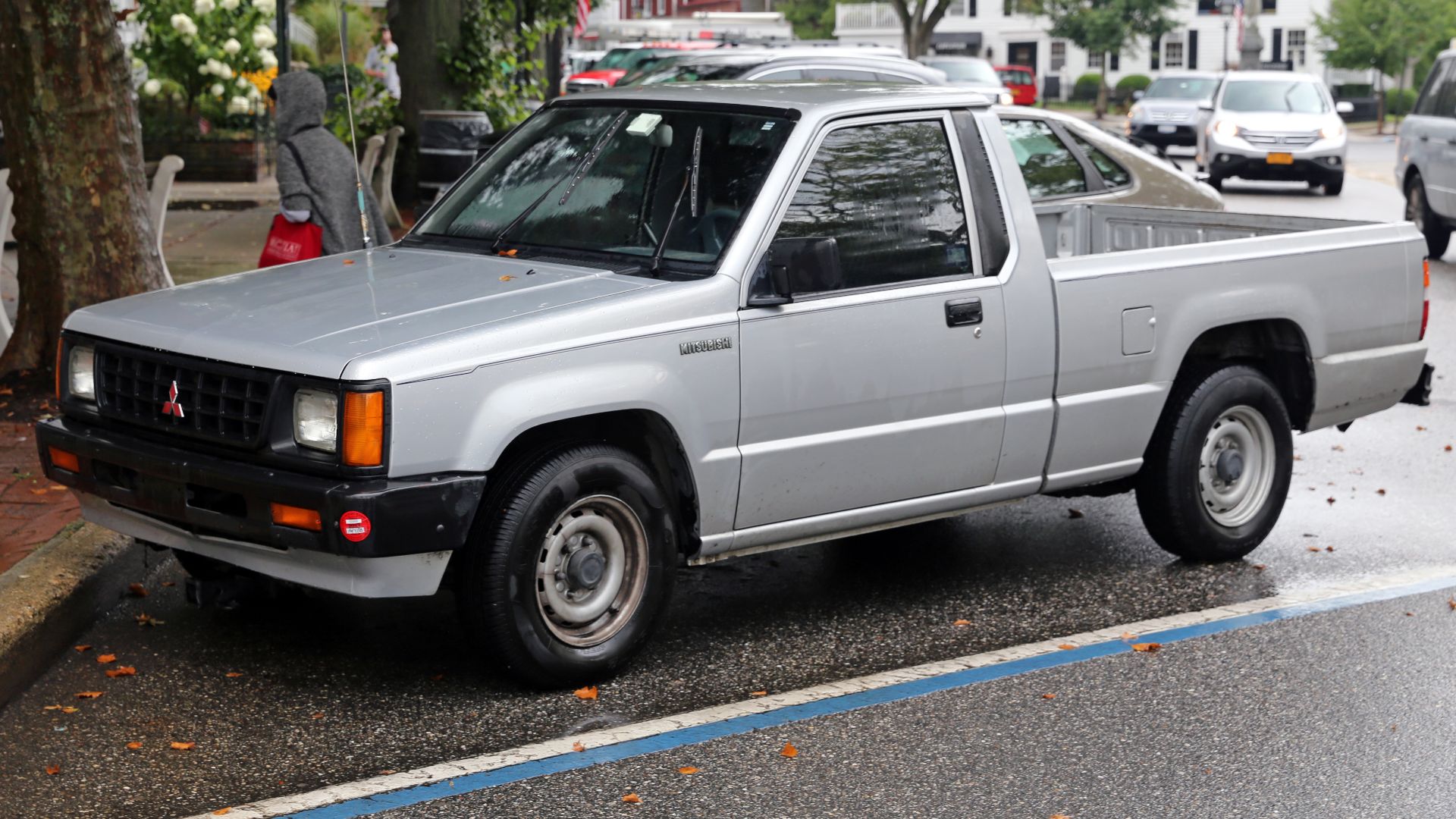 A 1992 Mitsubishi Mighty Max in Sag Harbor, NY. 2351cc inline-four (FL24W in chassis code) base version with the single cab.