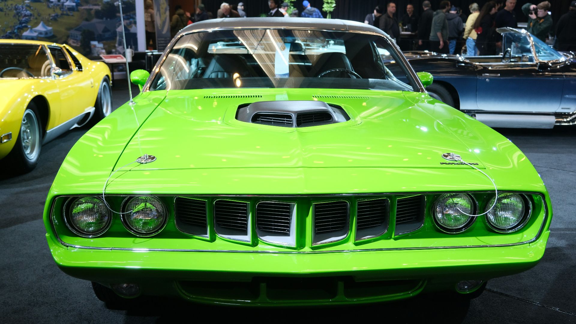 A bright green vintage muscle car