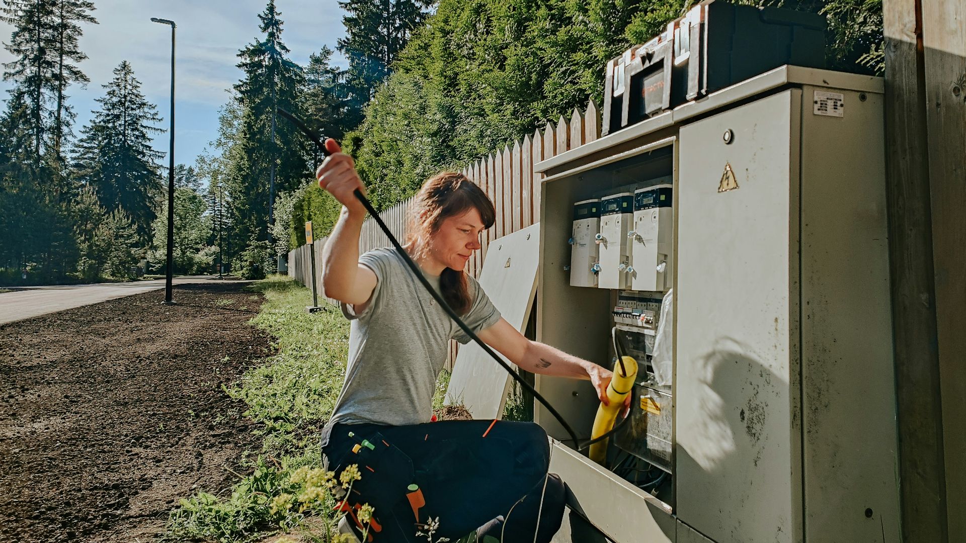 a man holding a drill