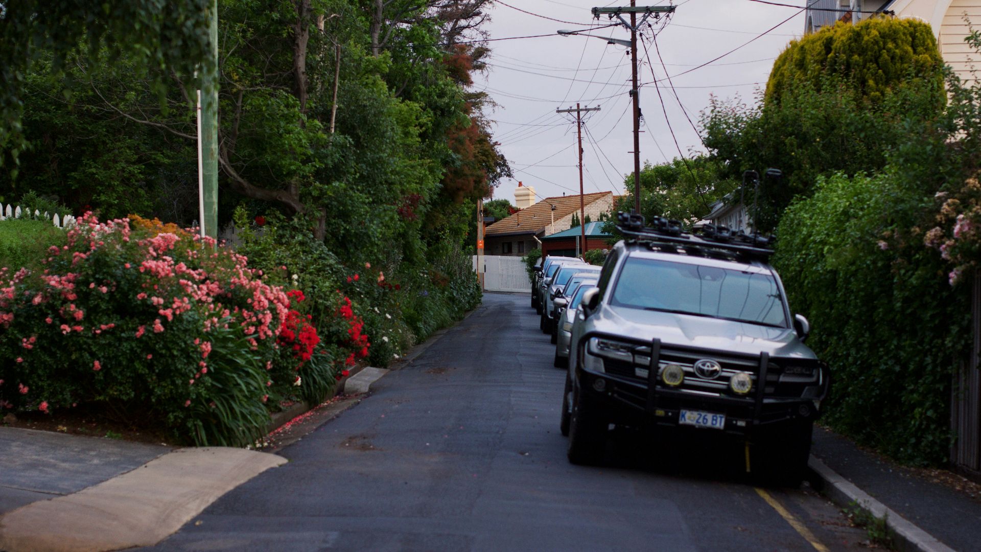 A car parked on the side of a road