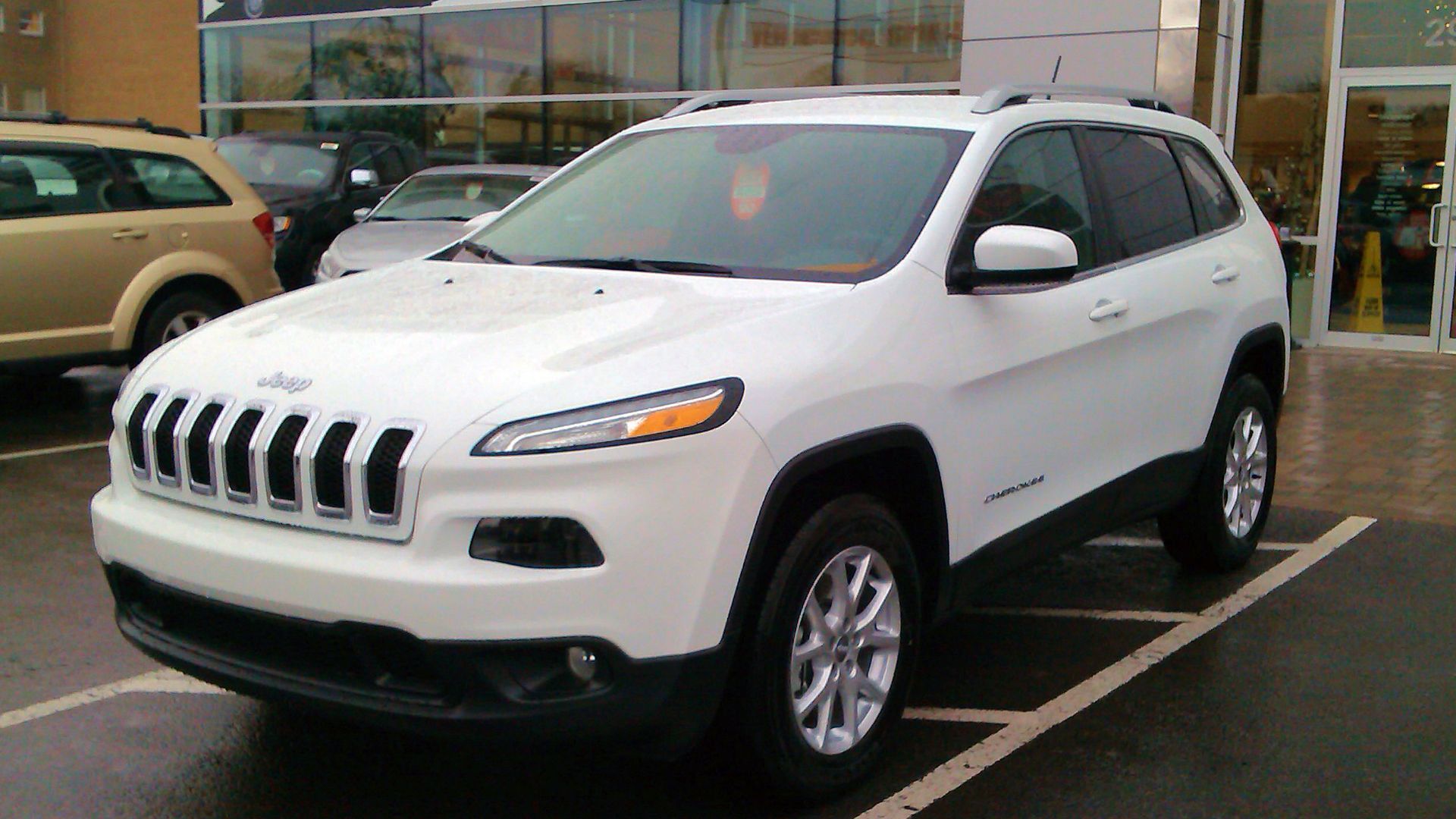 2014 Jeep Cherokee North 4x2 Edition photographed in Montreal, Quebec, Canada. Front 3/4 view.