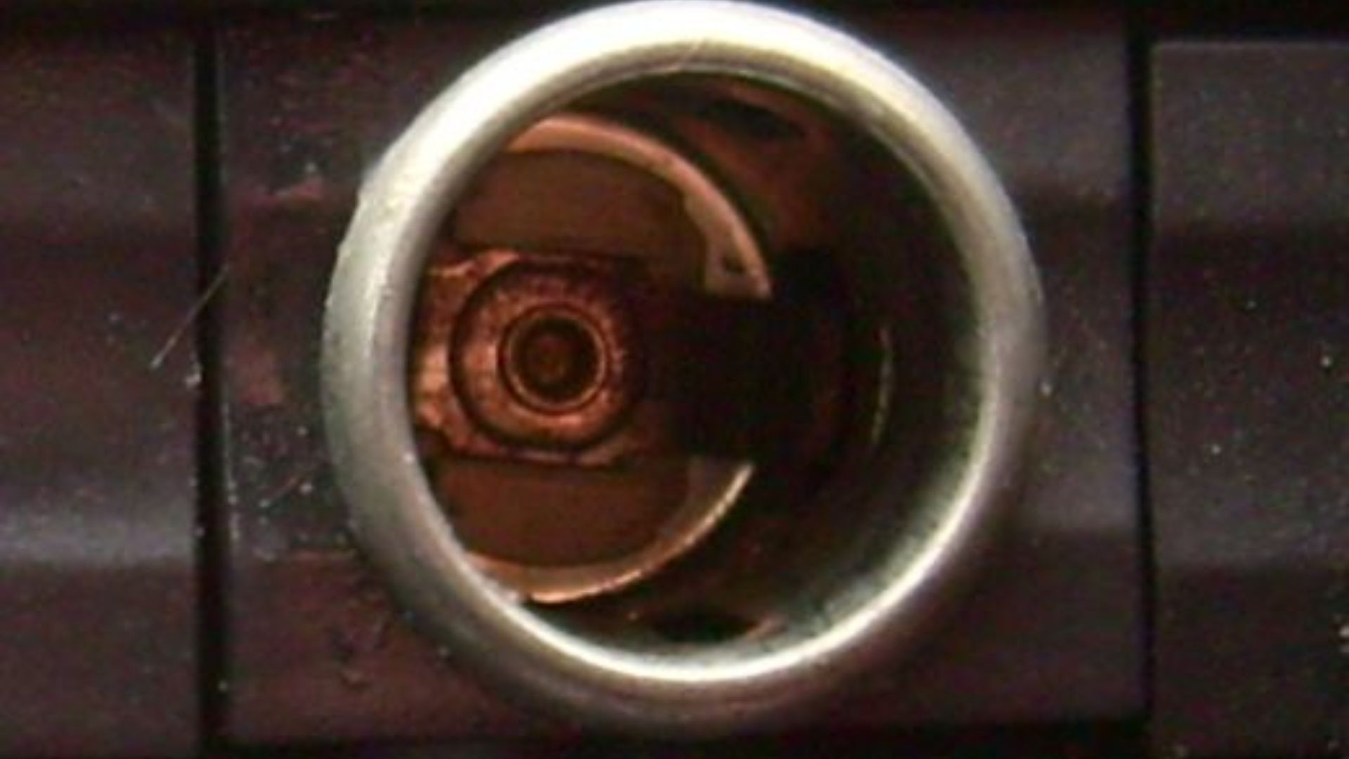Automobile power outlet mounted in a car dashboard for front passengers