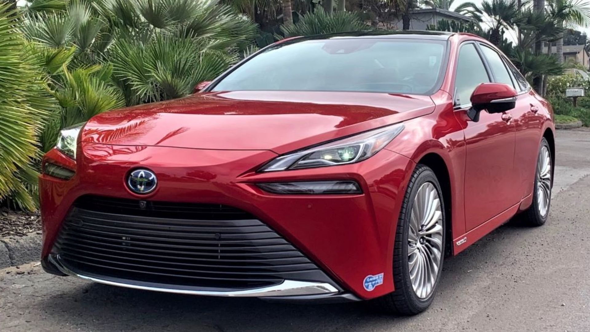 2021 Toyota Mirai, a fuel-cell electric vehicle. Front, three-quarter view.