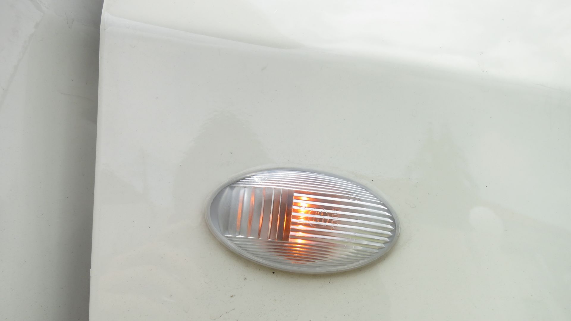Either taken at McDonald's Greenlane supplementary outdoor open air car park, Penang, Malaysia on the 6th of September 2019 or at a landed property on the 9th of September 2019 of a 2015 Perodua Axia 1.0 Standard G. Fender mounted indicator/turn signal on