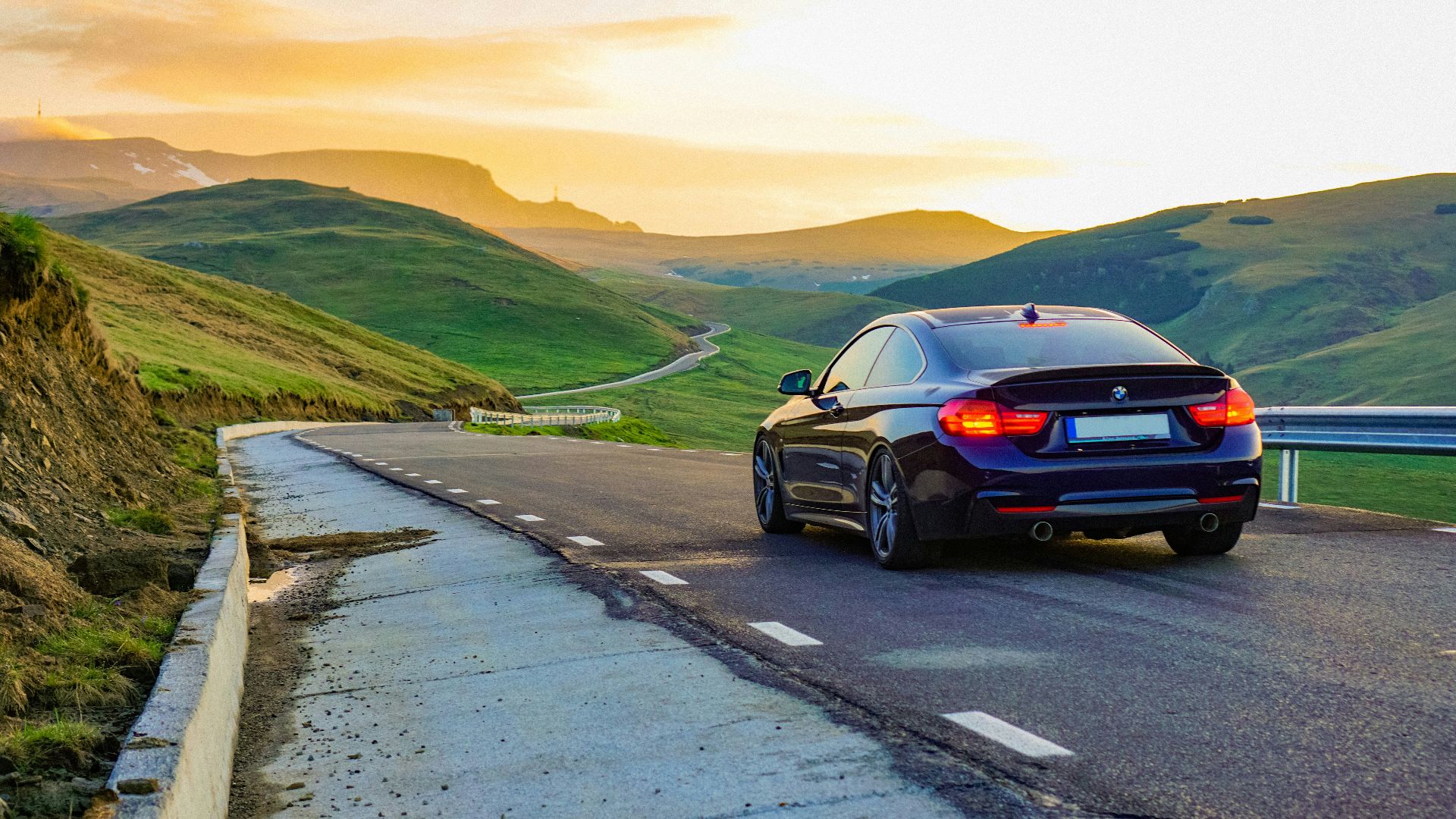 black car on road during daytime