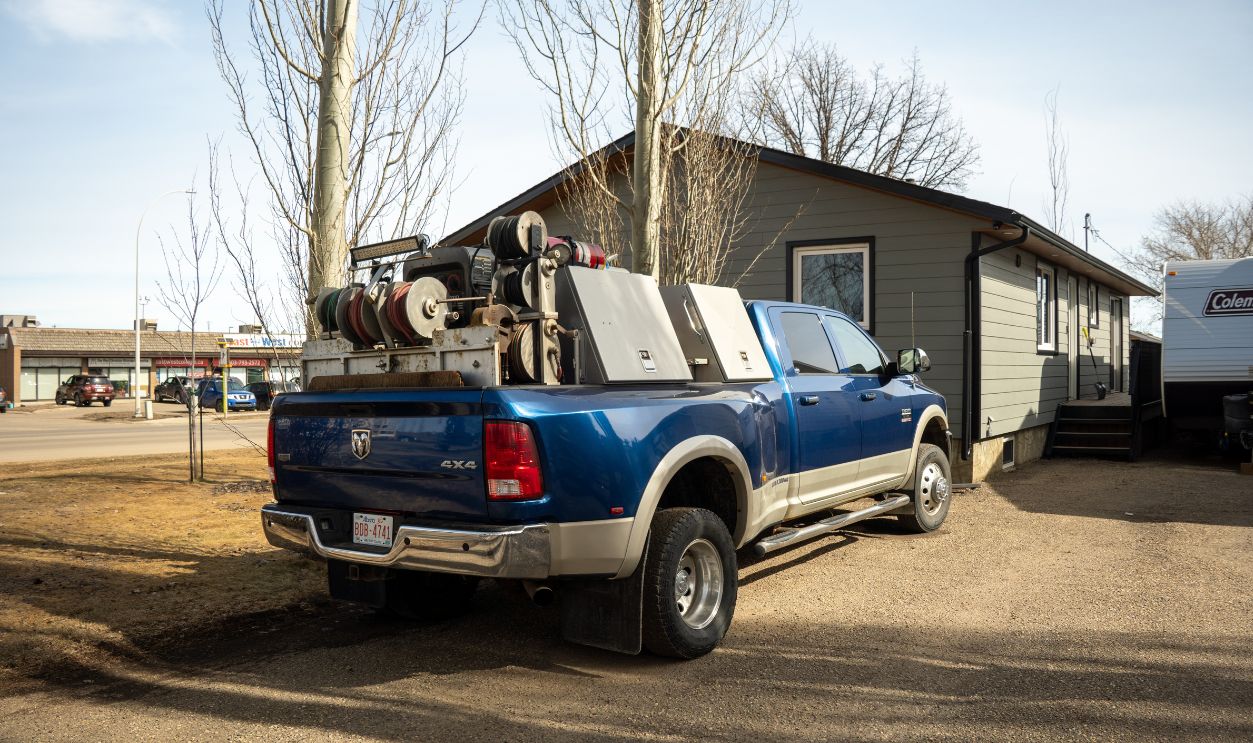 Brooks, Alberta - March 23, 2025: equipment and tools mounted on the bed of a pickup truck