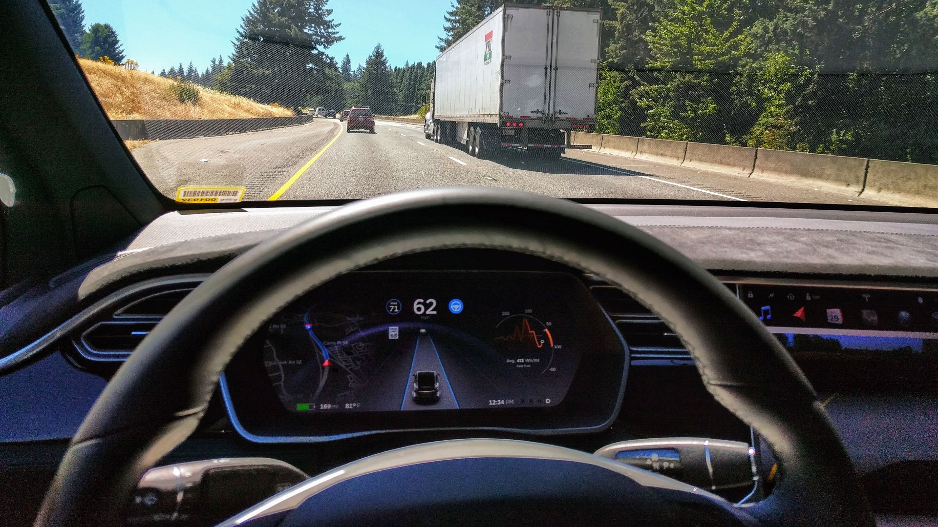Driving in traffic with Tesla's autopilot controlling distance from the lead car and centering the vehicle in the lane.
Vehicle is a 2017 Model X 75D with dark interior.