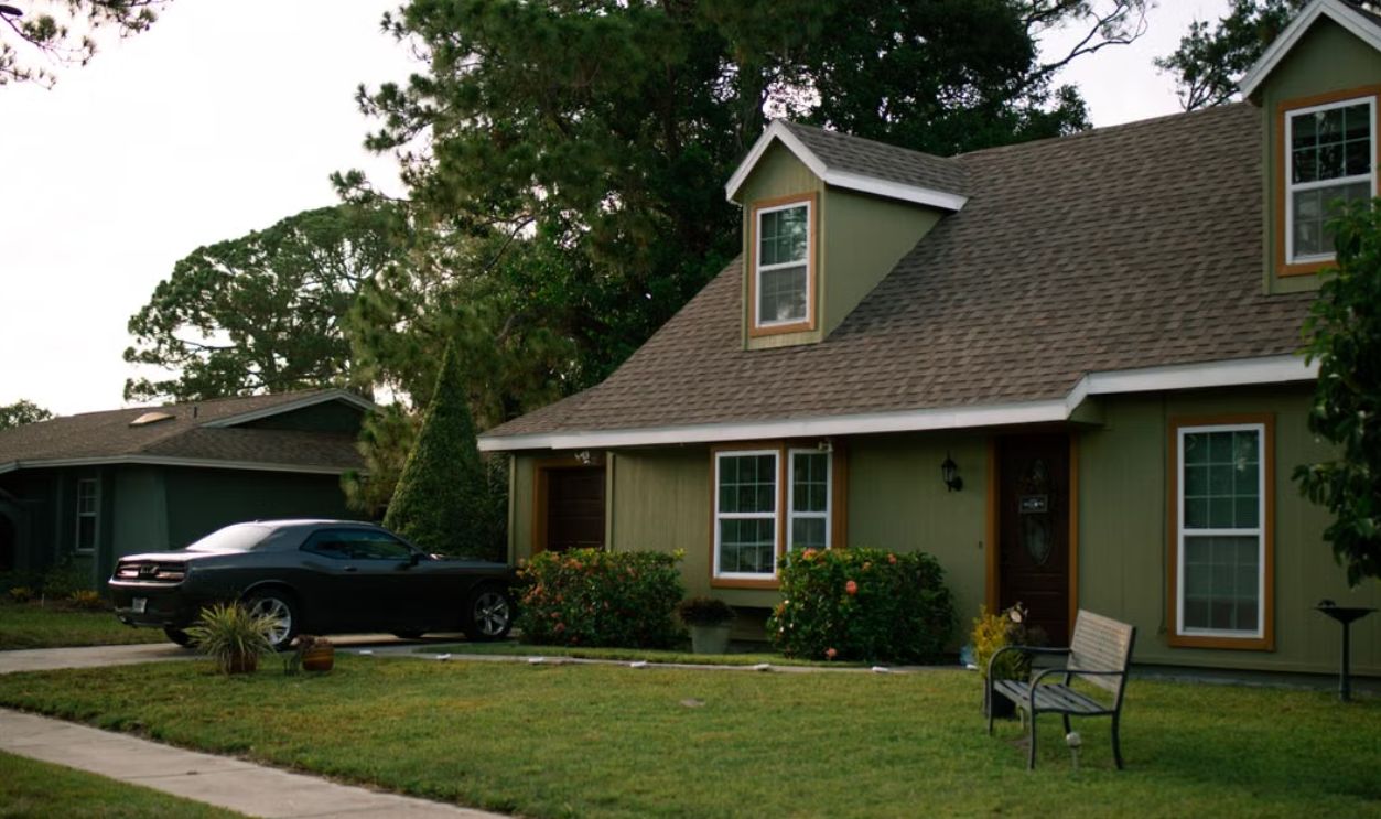 residential-house-and-a-car-parked-in-the-driveway