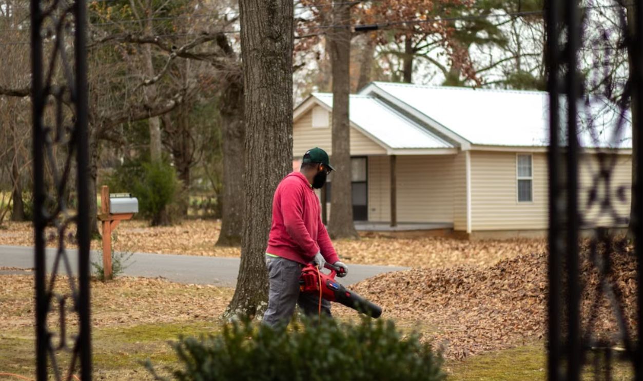 /man-working-with-blower-in-village