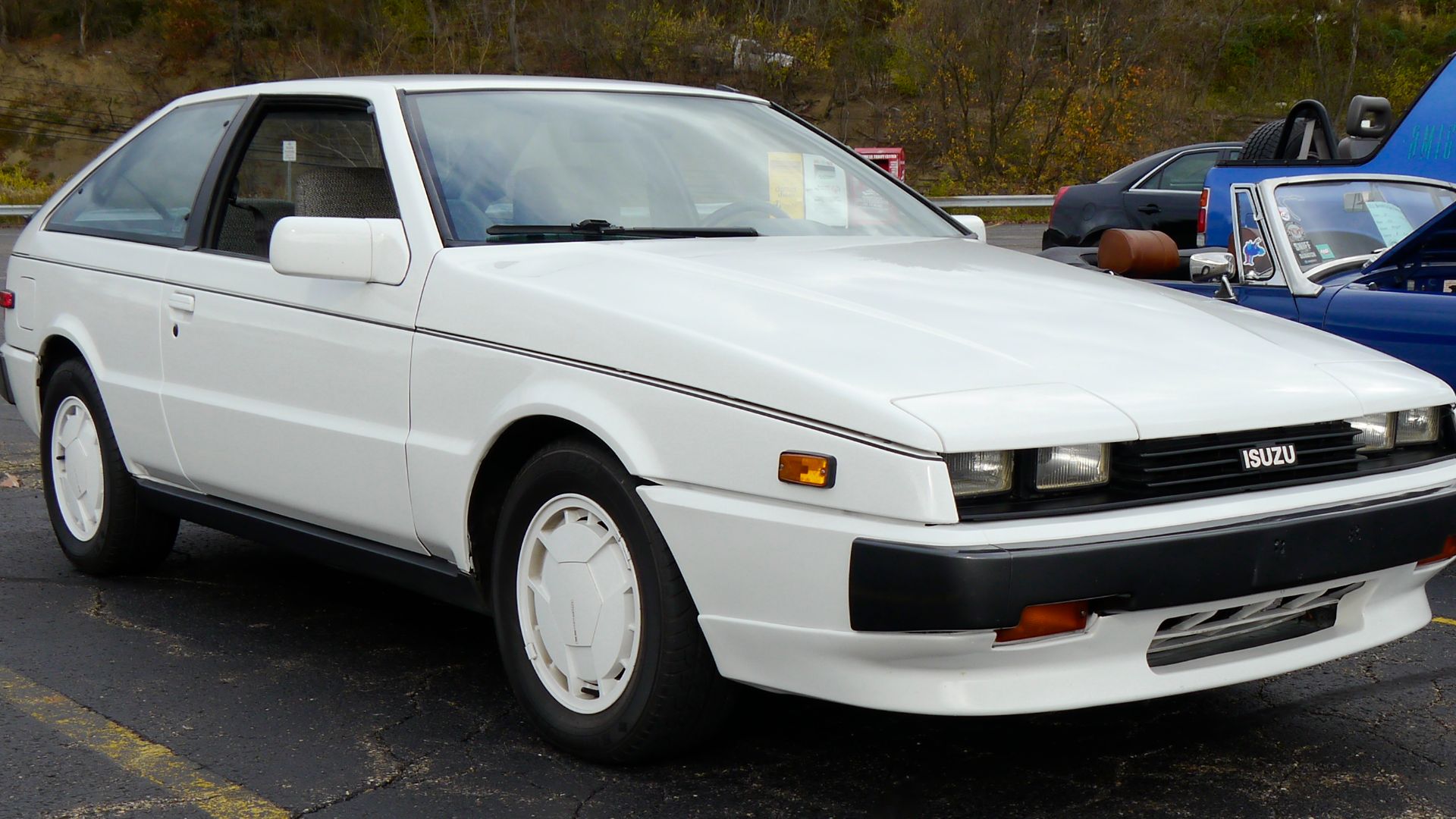 1987 Isuzu Impulse RS Turbo photographed at the Monroeville-Murrysville, PA Ultimate November Saturday Car Cruise, Monroeville, Pennsylvania. This Impulse is actually featured in a Hemmings article, probably with its previous owner, which is viewable here
