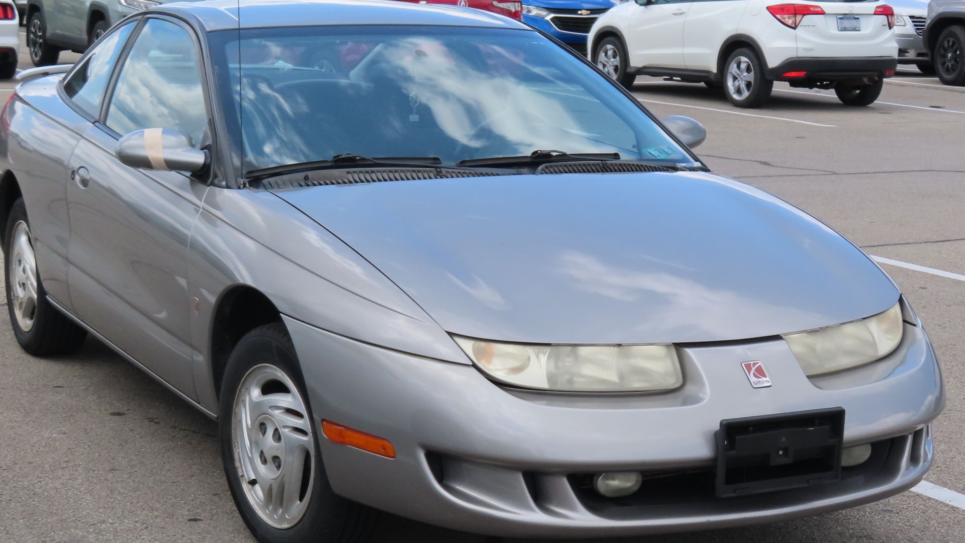 1998 Saturn SC2 photographed in Hermitage, Pennsylvania. Finished in Silver.