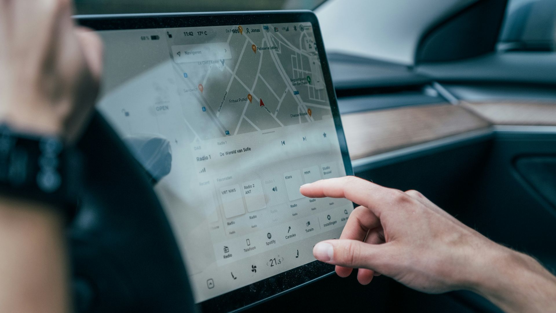 a person using a laptop in a car