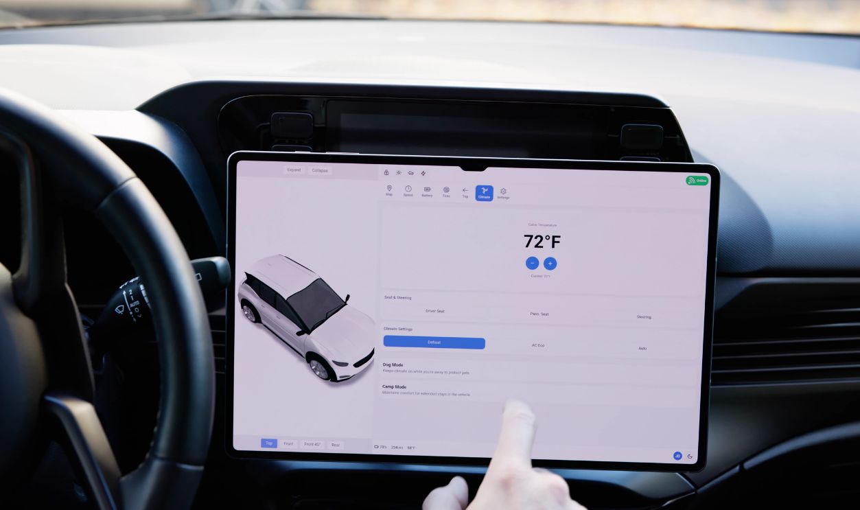 Young Male Using A Smart Touch Screen Dashboard.